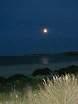 The moon rises over Old Harry  Studland United Nudists
